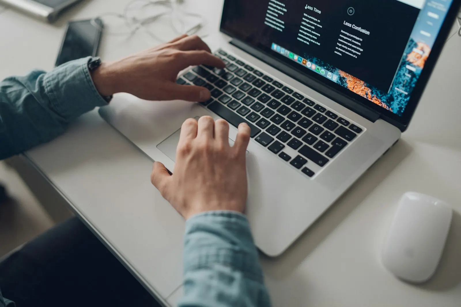 Someone working on a website on a laptop