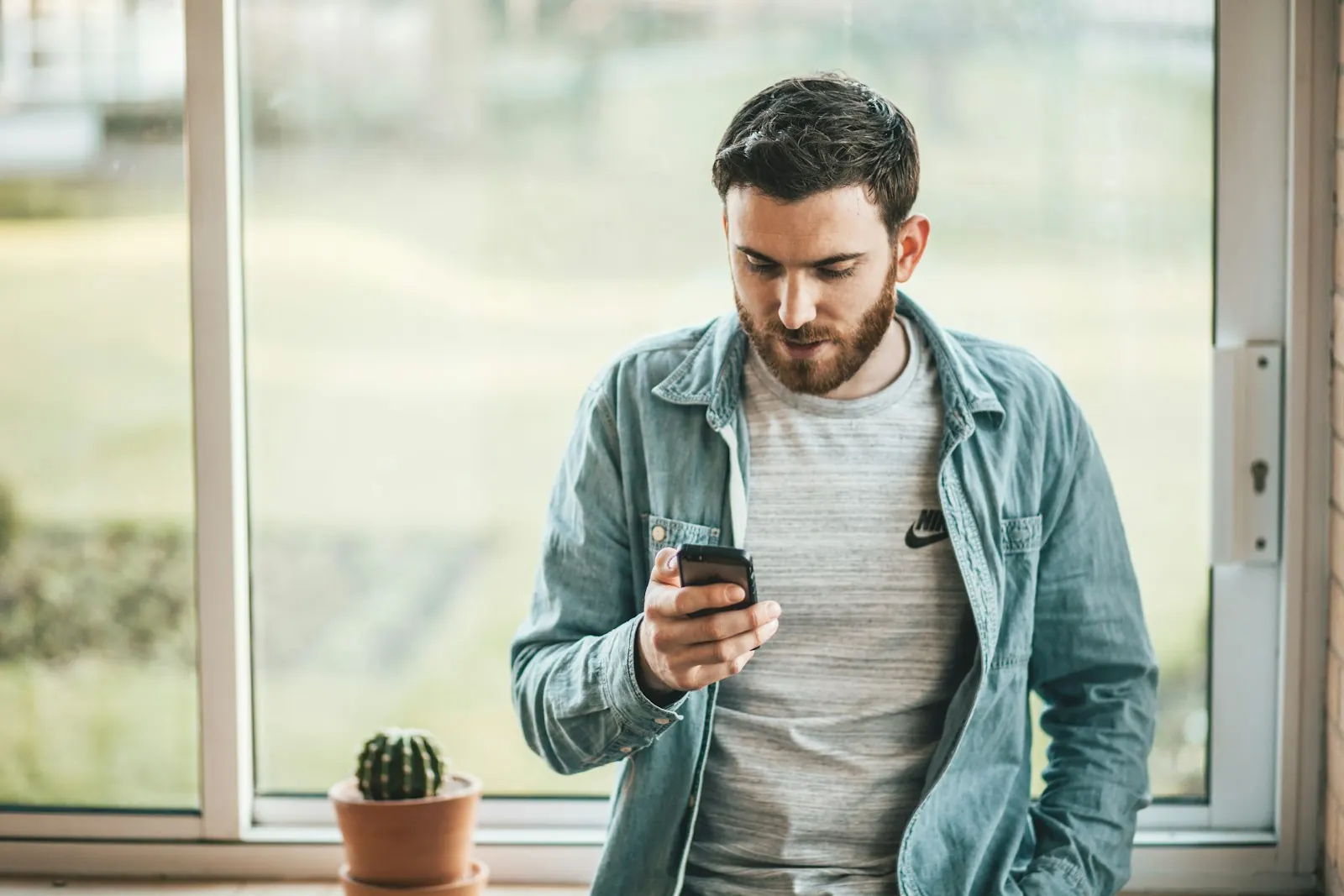 A homeowner looking at a website on his phone